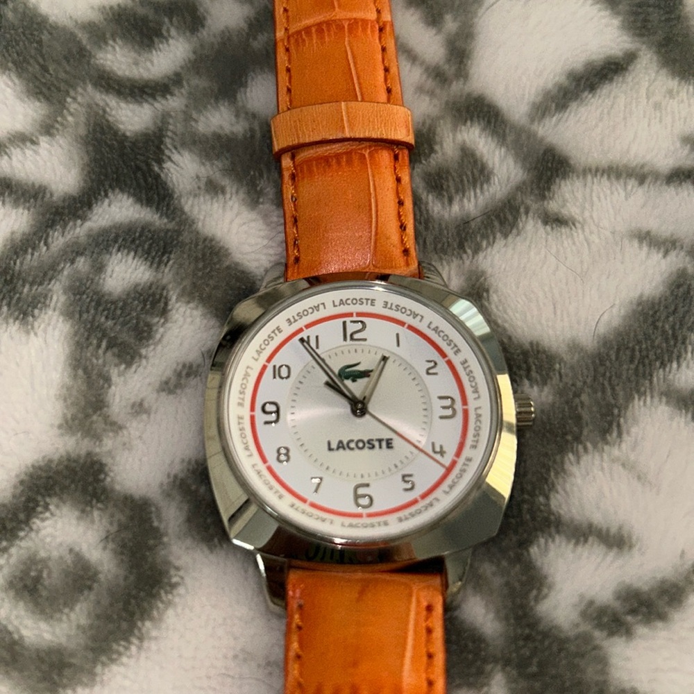 Lacoste silver watch with orange band